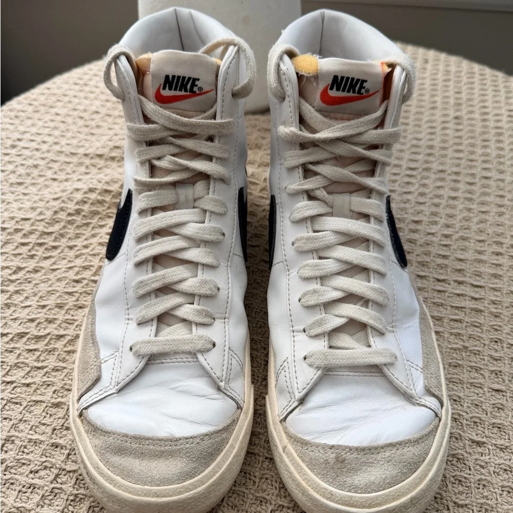 Nike Womens White High-Top Sneakers with Black Swoosh